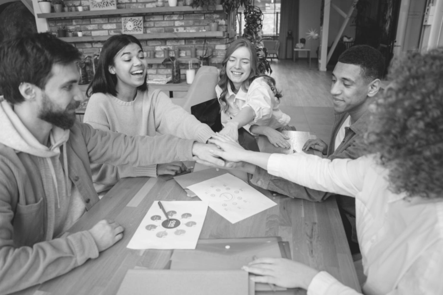 Manufacturing team reviewing ERP system interface during user acceptance testing phase