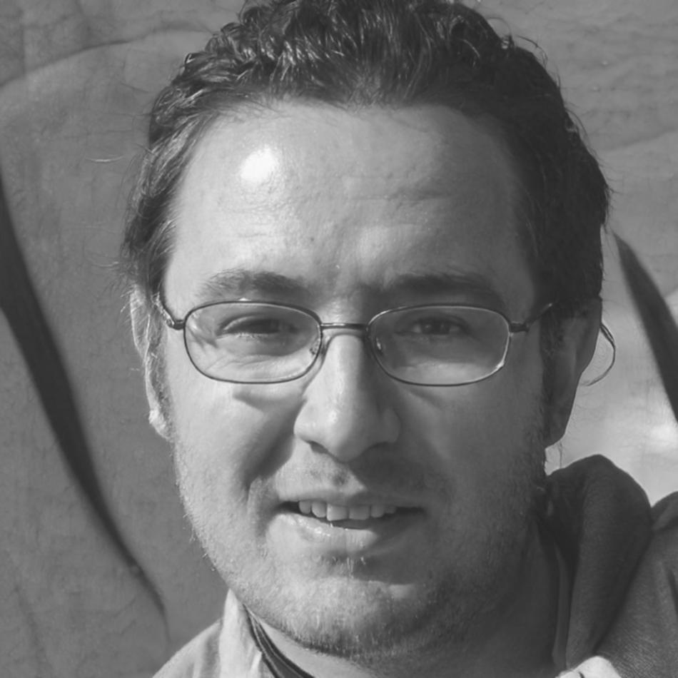 Professional headshot of Kittipong Naruebet, IT Director at Riverside Manufacturing