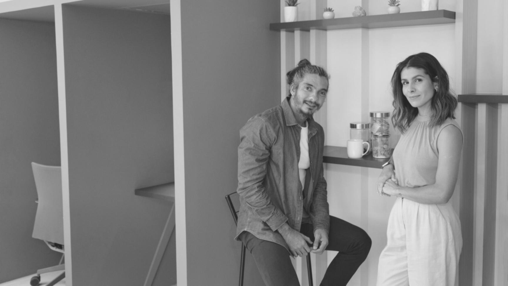 Professional testing coordination workspace showing multiple screens with business software and testing documentation