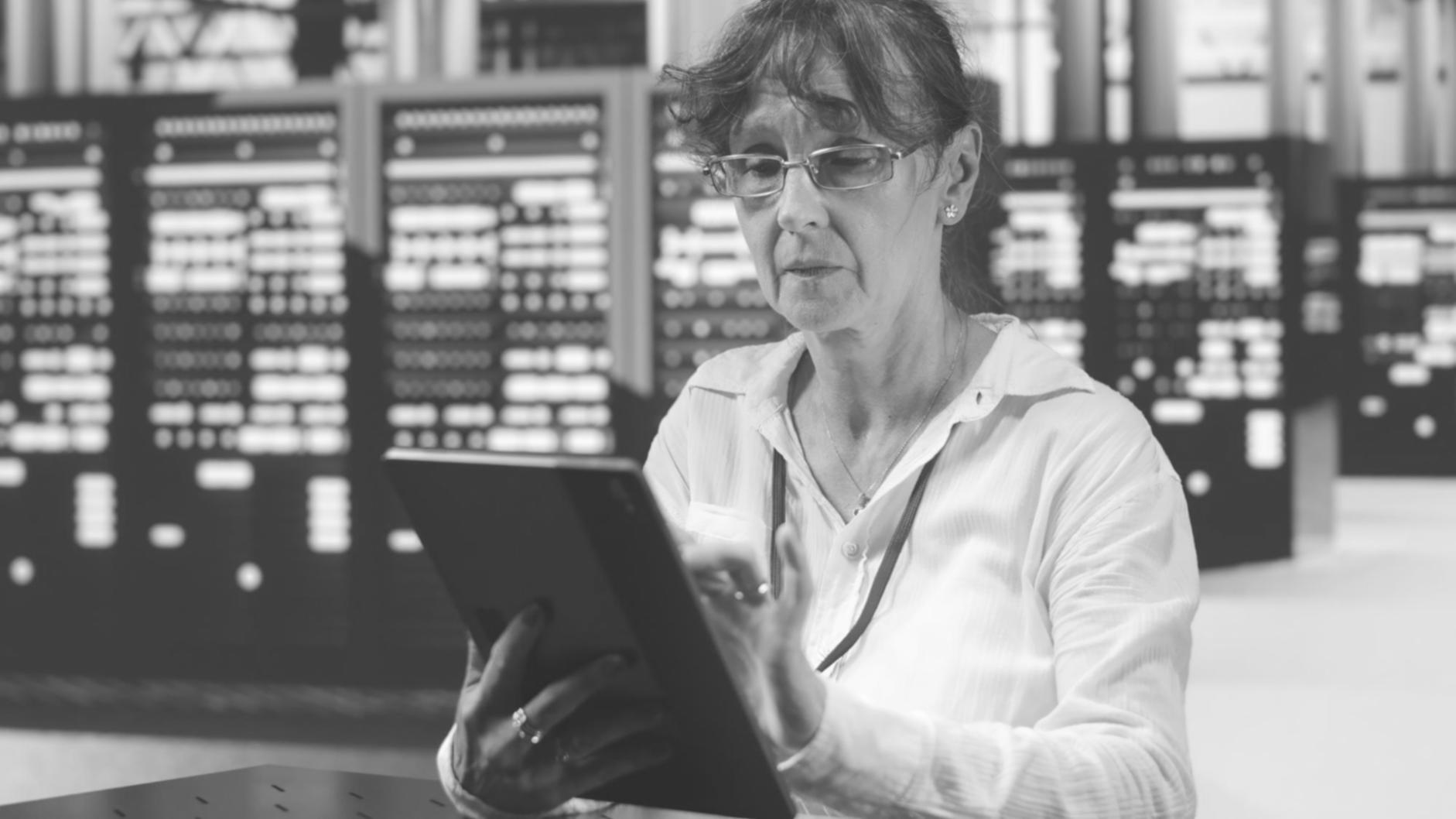 Business intelligence dashboard testing session with stakeholders reviewing data accuracy and user interface functionality